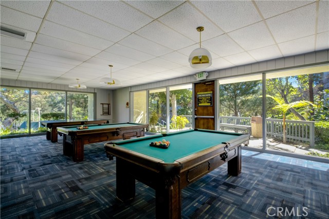 Full Billiards room with Foos Ball table as well!