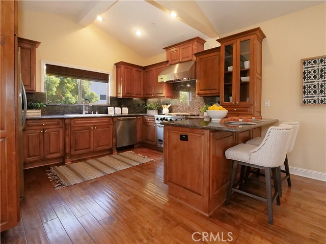 Enjoy sitting at the bar overlooking the kitchen.