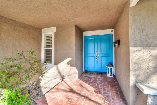 covered entry with double front doors