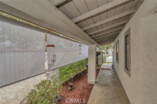 Privacy blinds line front walkway/entrance
