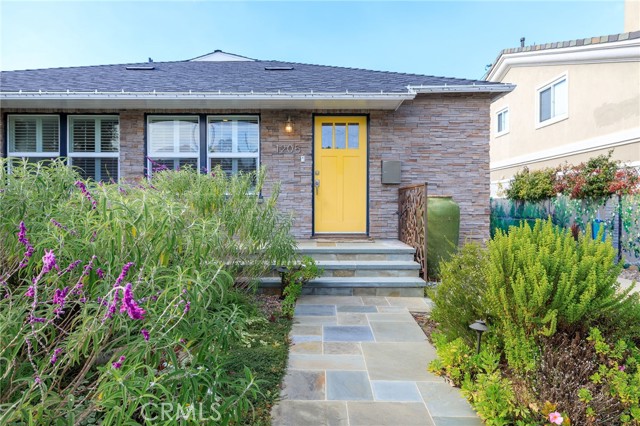 Delightful yellow front door