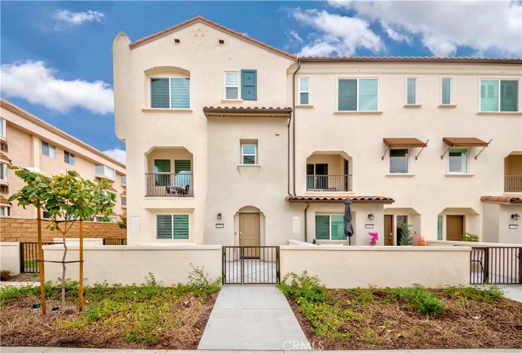 Welcome Home to 12914 Calabria Drive in the Prestigious City of La Mirada! Nestled in the High in Demand NEW community of Paloma! Beautifully remodeled Townhome offering one of a kind tri-level floor plan, 4beds/3.5baths, boasting 1,623 of abundant living space! Step into the main floor w/bedroom + ensuite bath & direct access to 2 car garage! Make way upstairs, you'll fall in love w/the large open great room it's light n bright! Huge living area & adjacent dining space & Elegantly remodeled kitchen w/granite countertop, chic white cabinets & high performance LG appliances. Plus, private cozy balcony to enjoy your morning coffee. Convenient 1/2 bath for guests. On the Top floor, Main master suite w/walk-in closet & en-suite luxuriously remodeled bath. Two more bedrooms w/ample closet space & hallway remodeled bath! On top of it this end unit home offers larger front patio to enjoy, recessed lighting throughout, custom window blinds, tons of smart home features & much more!! Convenient upper level laundry room. Low monthly HOA dues of $285. Centrally located near great schools, shopping, dining, parks, entertainment & easy 5 & 91 fwy commute. Don't miss this once in a lifetime opportunity!!