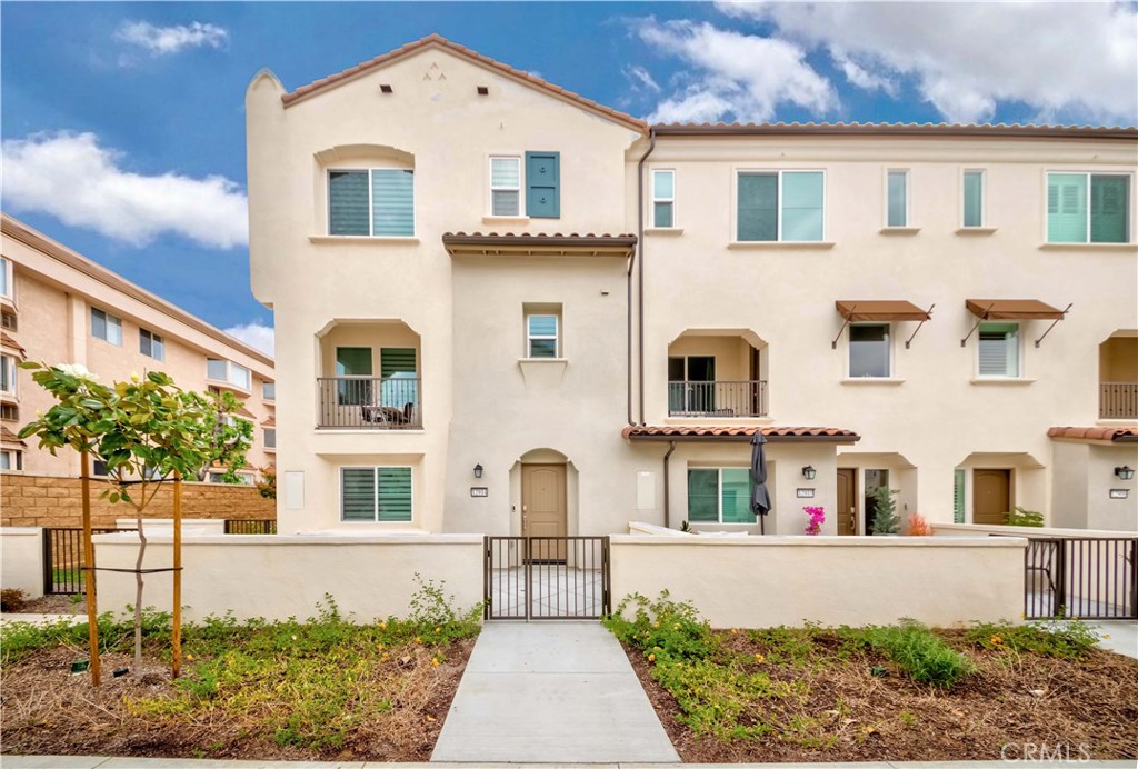 12914 Calabria Drive La Mirada, California Welcome Home to 12914 Calabria Drive in the Prestigious City of La Mirada! Nestled in the High in Demand NEW community of Paloma! Beautifully remodeled Townhome offering one of a kind tri-level floor plan, 4beds/3.5baths, boasting 1,623 of abundant living space! Step into the main floor w/bedroom + ensuite bath & direct access to 2 car garage! Make way upstairs, you'll fall in love w/the large open great room it's light n bright! Huge living area & adjacent dining space & Elegantly remodeled kitchen w/granite countertop, chic white cabinets & high performance LG appliances. Plus, private cozy balcony to enjoy your morning coffee. Convenient 1/2 bath for guests. On the Top floor, Main master suite w/walk-in closet & en-suite luxuriously remodeled bath. Two more bedrooms w/ample closet space & hallway remodeled bath! On top of it this end unit home offers larger front patio to enjoy, recessed lighting throughout, custom window blinds, tons of smart home features & much more!! Convenient upper level laundry room. Low monthly HOA dues of $285. Centrally located near great schools, shopping, dining, parks, entertainment & easy 5 & 91 fwy commute. Don't miss this once in a lifetime opportunity!!