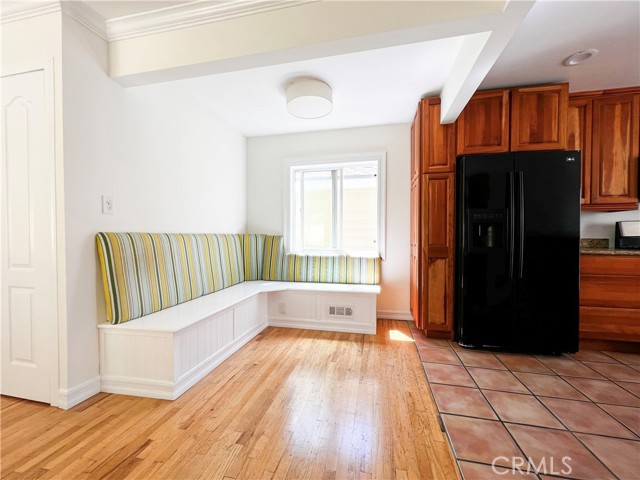 Dining area off of kitchen. Storage under seating.