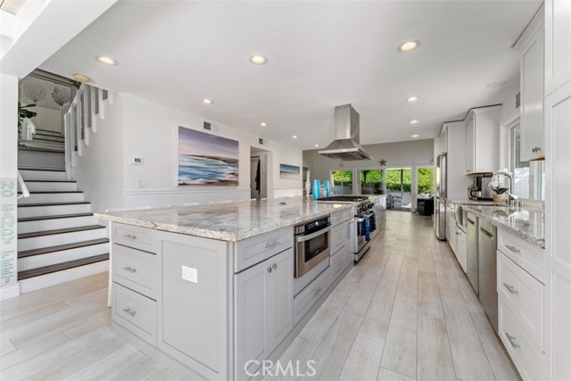 20 by 5 ft kitchen island with seating for 10