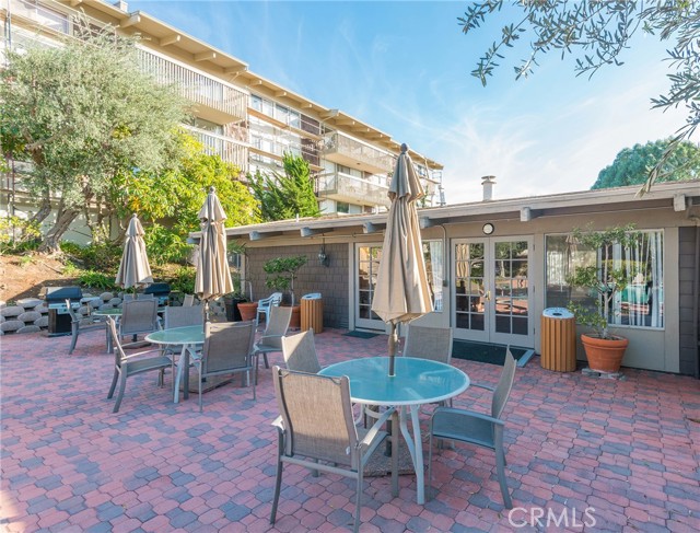 The community room and patio next to the pool