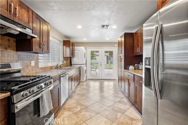 Kitchen, french doors leading to backyard