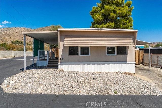 Detail Gallery Image 1 of 47 For 10888 West Dr #42,  Morongo Valley,  CA 92256 - 2 Beds | 1/1 Baths