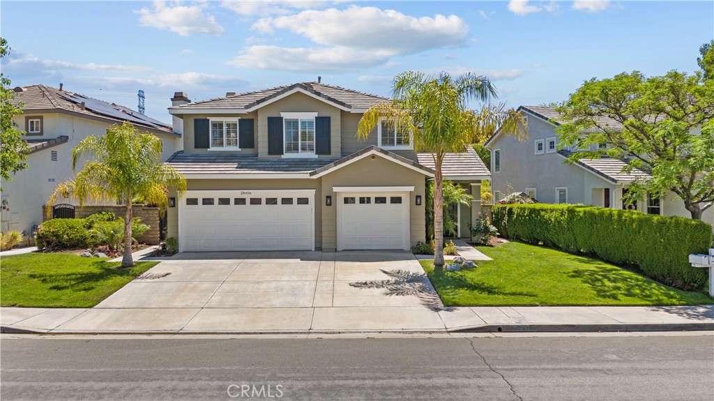 Experience elevated living in this Northpark Valencia stunner—4 beds, 2.5 baths, 2,350 sq ft of beautifully upgraded space. Jaw-dropping travertine floors, a gourmet granite kitchen, engineered hardwood upstairs, and marble-adorned baths set the tone for luxury. Enjoy surround sound, ethernet in every room, and a dreamy entertainer’s backyard with BBQ and large patio. Leased solar panels provide more than enough power for the entire home and two electric vehicles. A turnkey dream home in a coveted community!