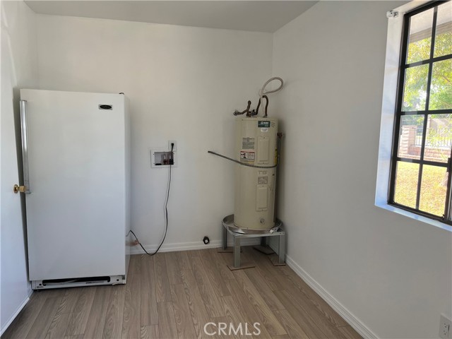 Laundry room with Stand up Freezer