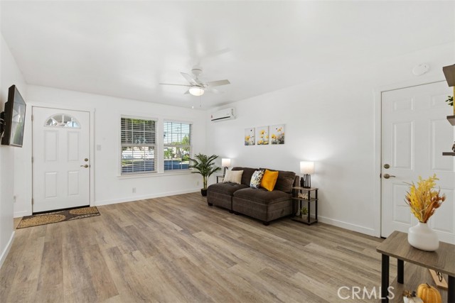 Living room with direct garage access.