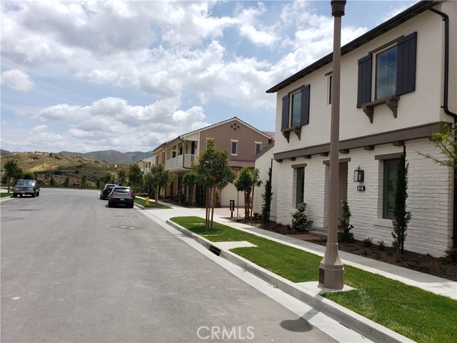 112 Donati Irvine, California Bread new construction detached home in the Orchard Hills Reserve gated community, Verdi neighborhood build by Irvine pacific, surrounded by shopping ,dining , and entertainment centers , This 2459 SF plan Residence includes first floor Master Bedroom and an extra Bonus room and guest bathroom , 3 bedrooms 2 baths upstairs, Gourmet KitchenAid stainless steel appliances, including cooktop ,oven microwave combination, dishwasher and hood, Great room floorplan is further enhanced by the panoramic sliding glass door, resulting in increased opportunities for sunlight , fresh air and entertainment, Home is in walking distance to Reserve's private resort style community park and pool area.