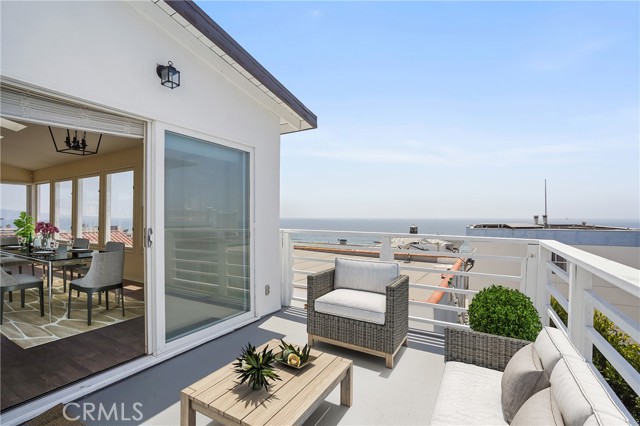 Rear deck off kitchen & dining area, MB Pier, Palos Verdes to Malibu (virtually staged)