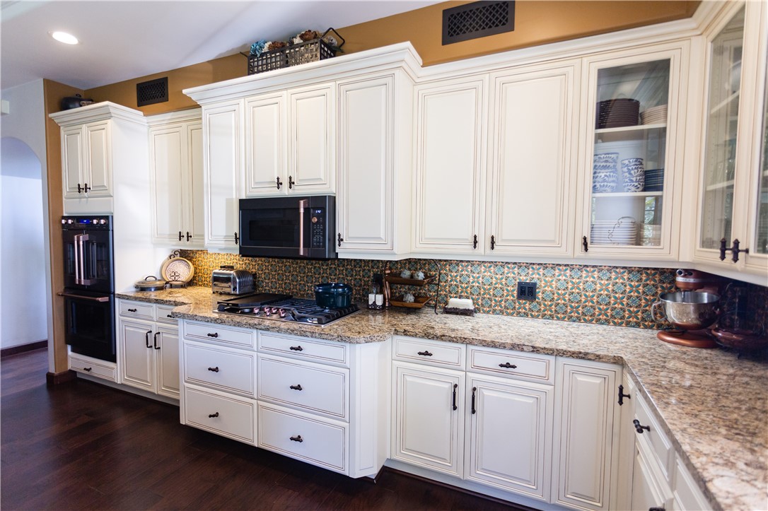 Kitchen cabinets are all custom made and painted.