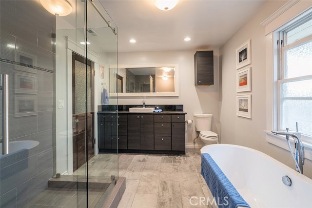 Upstairs bath remodeled to act as the guest bath after the envisioned merger of the back bedrooms and ensuite bath.