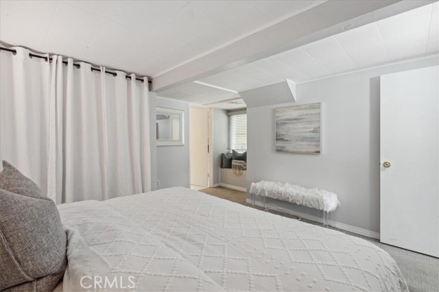 Master bedroom has natural light and two closets.