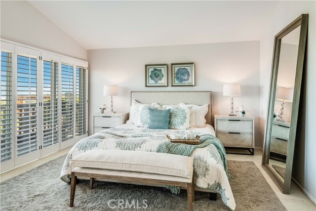 Main bedroom suite with walk-in close, deck with sweeping view and remodeled bath Main bedroom suite with walk-in close, deck with sweeping view and remodeled bath