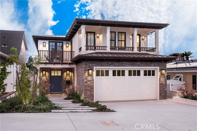1801 Oak Avenue Manhattan Beach, California Newly constructed, this coastal contemporary residence presents refined living in over 5,200 square feet of distinguished spaces. Featuring six bedrooms, four-and-a-half baths, and a 2000 square-foot lower level, this home is a combination of modern designer details and exceptional amenities. From the brightly lit entryway into the modern, open-air dining room, living room and kitchen, the contemporary coastal flair welcomes and delights. High beamed ceilings and an eye-catching fireplace wall characterize the living room, with accordion-glass doors leading to the private patio with Lynx barbecue. The Chef’s kitchen is a dream - outfitted with furniture-grade cabinetry and premium Sub Zero, Wolf, Bosch and Miele appliances as well as a built-in wet bar and desk. The second-floor features four premium bedrooms and bathrooms including the incredible Master suite with large walk-in closet, fireplace, deck, and spa-like Master bath. The basement level includes a generous wet bar with sink, dishwasher, icemaker, and fridge, 1,000+ wine cellar, spacious family room, state-of-the-art home theater, office, guest room and full bath. An elevator and convenient second-floor laundry room add to the amenities of this custom home. Fully-equipped Smart home. Located in the heart of Manhattan Beach’s tree section and convenient to area schools, restaurants and shopping, this is an iconic beach home that will bring joy for generations.