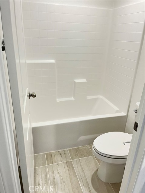 Hall bathroom, bath and toilet