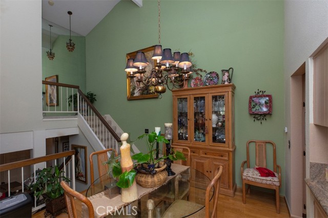 Dining room with stairs to primary suite