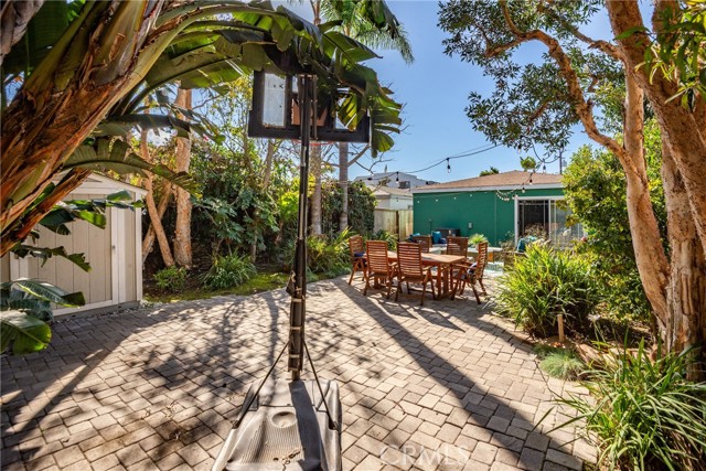 Yep.....basketball....and dining.....and lounge seeting.....and storage shed surrounded by beautiful mature landscaping