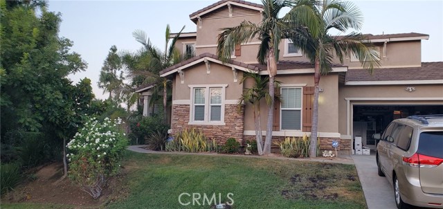 16128 Jordana Circle Riverside, California A beautiful home in the La Sierra, Stone Harbor HOA area. It is a 4 bedroom 3.5 bathroom Executive Home on a cul-de-sac. Low HOA. MetroLink & freeway are just minutes away. Great for all kinds of commuters. Gourmet kitchen has Stainless steel appliances, double oven, microwave, gas cook top, granite counters, kitchen island, tons of storage, food & butlers pantry included, upgraded tile flooring throughout. Recessed lighting, stone fireplace with raised hearth and much more. High vaulted ceiling, wider staircase, formal entryway, living & dining rooms. The family room opens to the kitchen so it's perfect for entertaining. You'll love the patio & patio cover with ceiling fans to compliment your pool sized lot! (All measurements are approx, Patio measures 16' X 64'. Flat area minus side garden is 74' X 90'. Rear Slope is 65' X 58' and side slope is 12'X 180'. Slopes are trenched for stairstep walls. Back yard piped for lighting wires.) The amazing Master suite has walk-in closet, dual sinks in vanity. Sunken tub and large walk-in two showerheads shower. Enjoy sunsets from the personal deck off the master. There are 2 other large bedrooms upstairs with a loft that is premade for a bedroom with a bathroom should you want another room. Also one bedroom with bathroom attached on first floor of home. The laundry room features cabinets, soaking sink off the kitchen. 3 car garage and one is completely separate all have custom overhead storage & house entry. Schedule Showing today!!