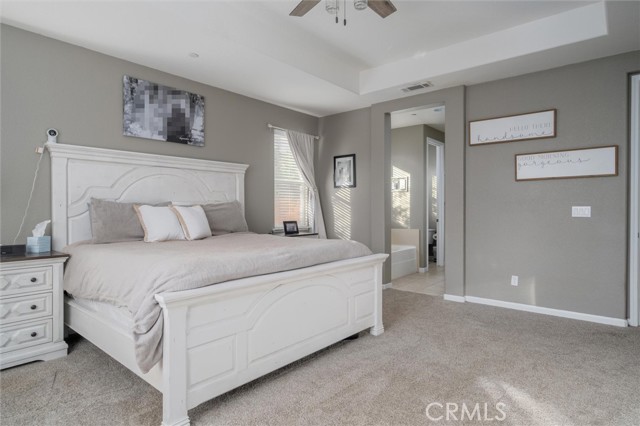 Master bedroom showing entrance into master bathroom