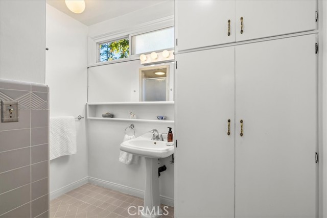 Private bathroom with shower off primary bedroom. Plenty of storage for your toiletries and products