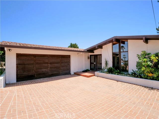 Brick driveway to main entry