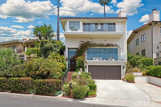 Beautiful curb appeal with panoramic ocean/Catalina and sunset views!