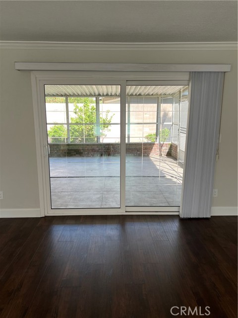 Living room looking at outside enclosed patio