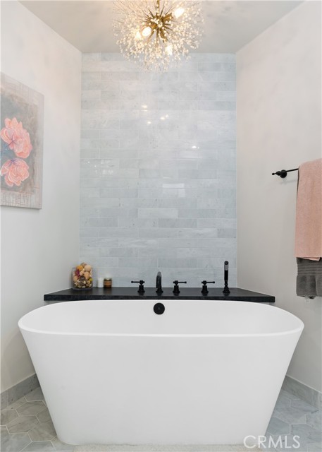The spa-like bath with the soaking Roman tub.