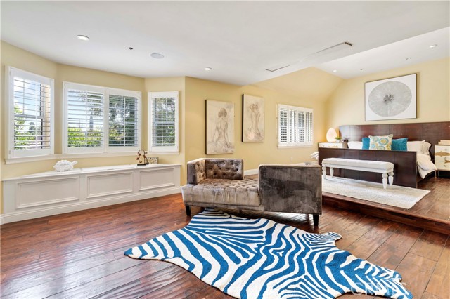 Huge master suite with a love chair sitting area, bay windows on  south side