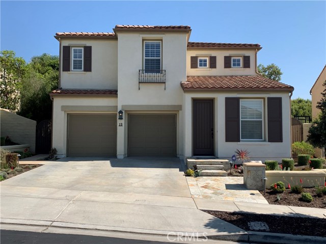 San Clemente, California Located on a private lot, this home features a main floor bedroom, full bathroom, an upstairs study w/built-ins, and a spacious living/dining combo featuring more custom built-in shelving and cabinets. A large gourmet kitchen with stainless steel appliances, granite backsplashes also features a separate kitchen island with a huge dining nook equipped with built-in display cabinetry. The open-concept family room boasts a fireplace and built-in entertainment center. Enjoy outdoor living with a relaxing side courtyard area and a spacious, newly landscaped and private backyard featuring a fire pit and built-in outdoor grill. and an individual laundry with storage. Nicely upgraded throughout, this home is complimented by new carpet and fresh interior paint throughout, recessed lighting, plantation shutters, and indoor and outdoor audio. The garage has been highly customized with epoxy flooring, built-in racks, cabinets and hooks, overhead storage, and an electric vehicle charger. A short distance to award winning Vista Del Mar School, Liberty Park, and the Talega Village Shopping Center, the location could not be better!