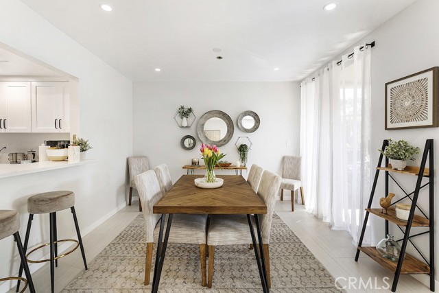 Dining room with large sliders leading to patio