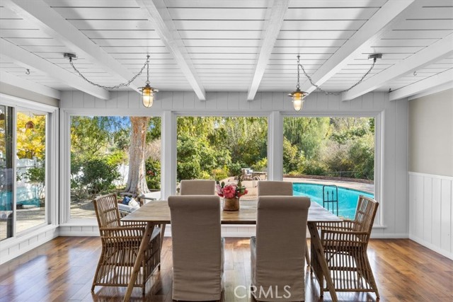 Dining room has views of the serene and private backyard.