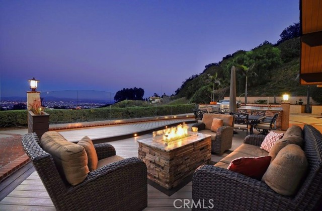 Front Patio with Firepit  & BBQ Station at Night