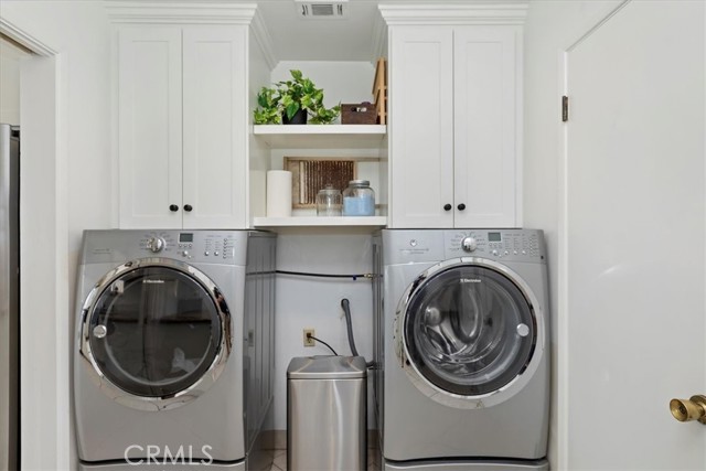 Laundry room.  Also has access to bonus room