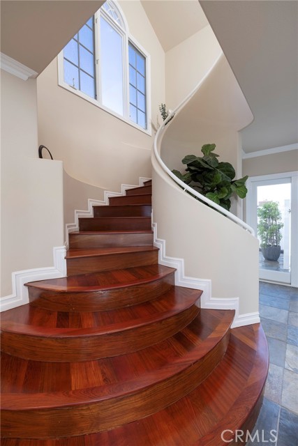Beautiful hardwood spiral staircase.