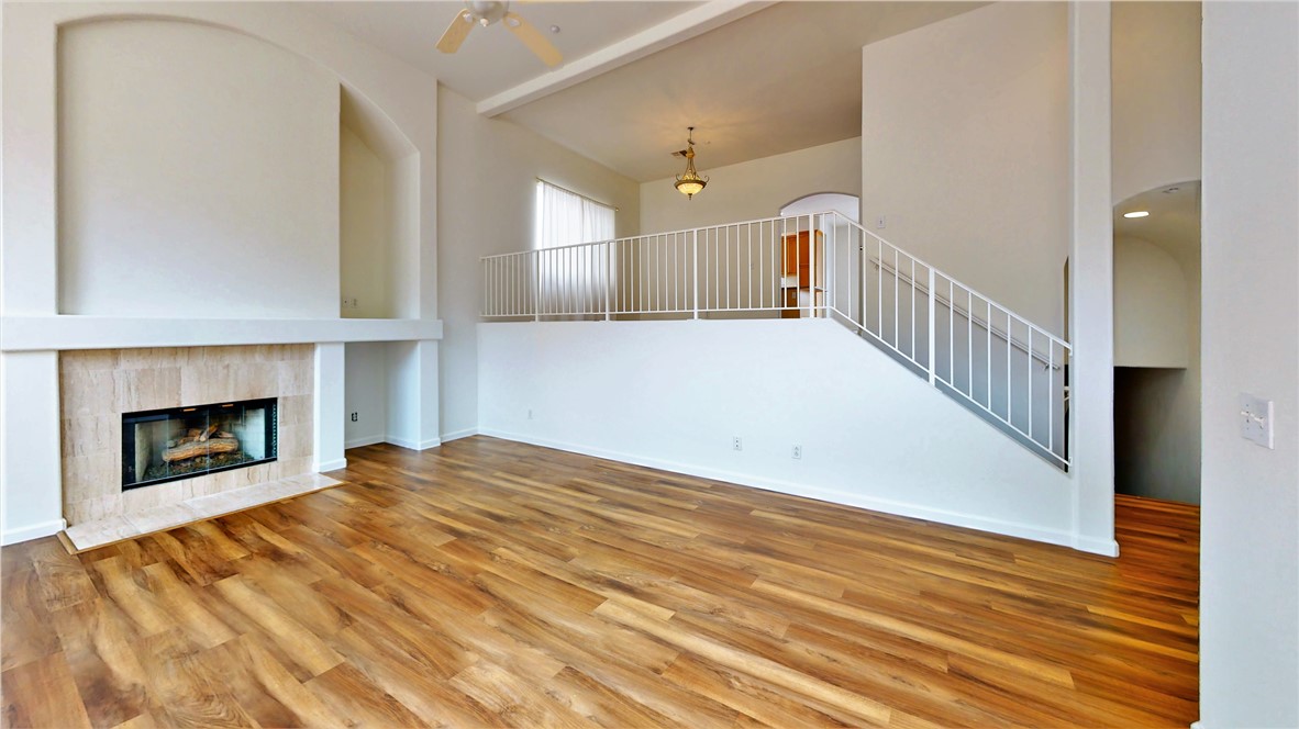 Fireplace in Living Room with the Dining area above