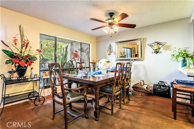 The Dining Room is Bright and Open and has a Large Window Letting in the Light. This area will accommodate a Very Large Dining Set and Buffet.