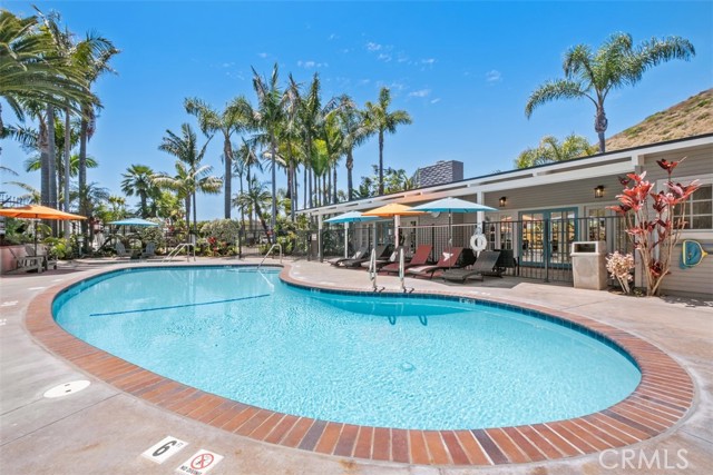 Community heated and fenced in pool area