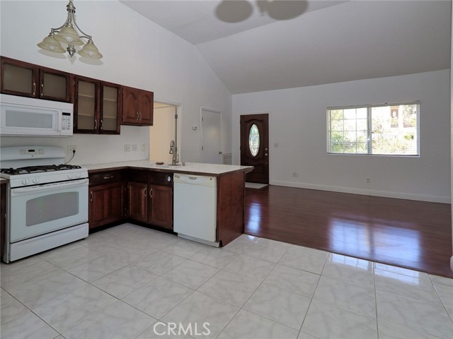 Propane Stove, Electric Microwave & Dishwasher.