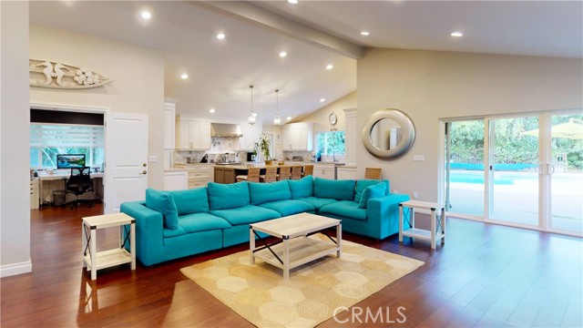 Living room looks into the updated Kitchen