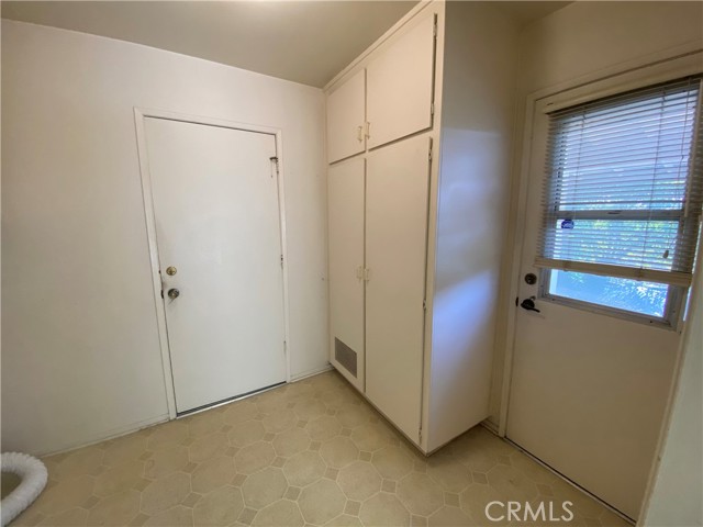 Laundry door access to garage and side yard