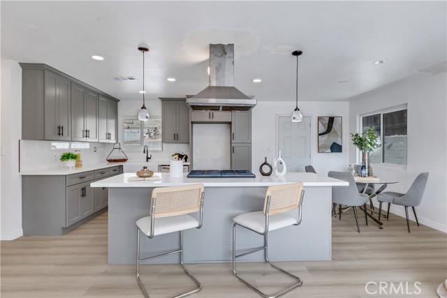 Kitchen w/ New Cabinetry / New Quartz Countertops / New Pendant Lights.