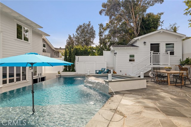 In Pool Baja Lounge Seating Shaded by Built-In Umbrella Stand