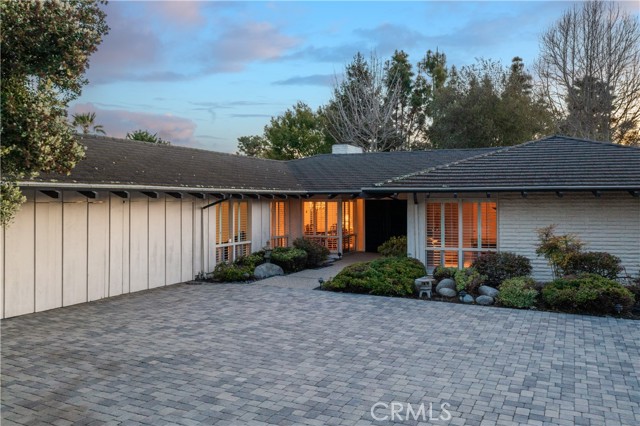 California Ranch style home will charm and impress with its timeless appeal.