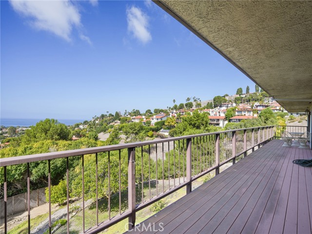 and opens to the balcony. and opens to the balcony.