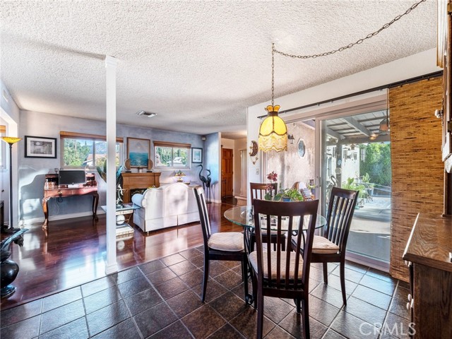 Dining area is cozy and convenient to the kitchen.